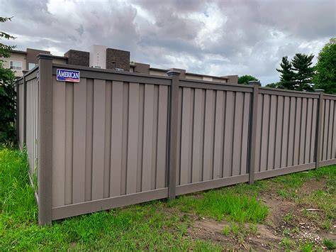 shadow box 6ft fence and black metal fence together|residential shadow box fence.